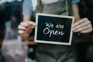 open sign for under-resourced small businesses rebuild